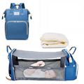 3-in-1 Diaper Bag Backpack – Foldable Baby Bed & USB Charging