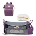 3-in-1 Diaper Bag Backpack – Foldable Baby Bed & USB Charging